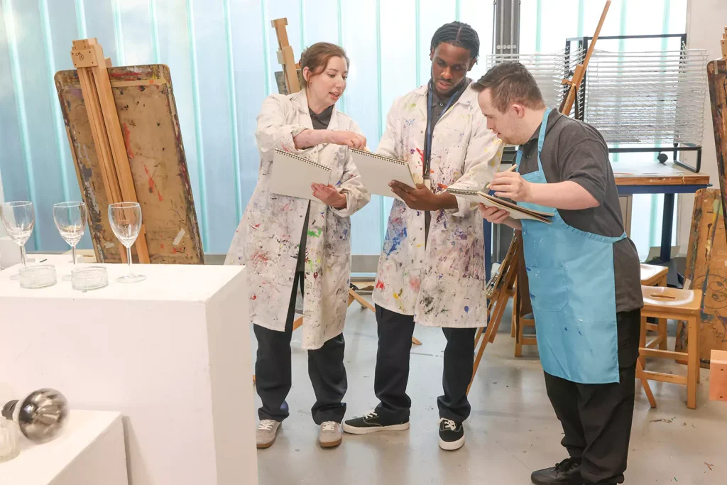A group of disabled friends are enjoying an art class together